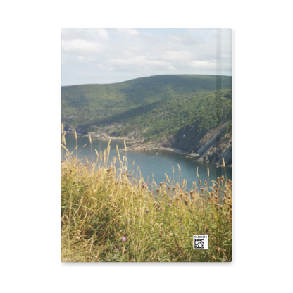 Back cover of hardcover journal featuring a Nova Scotia coastal cove photograph